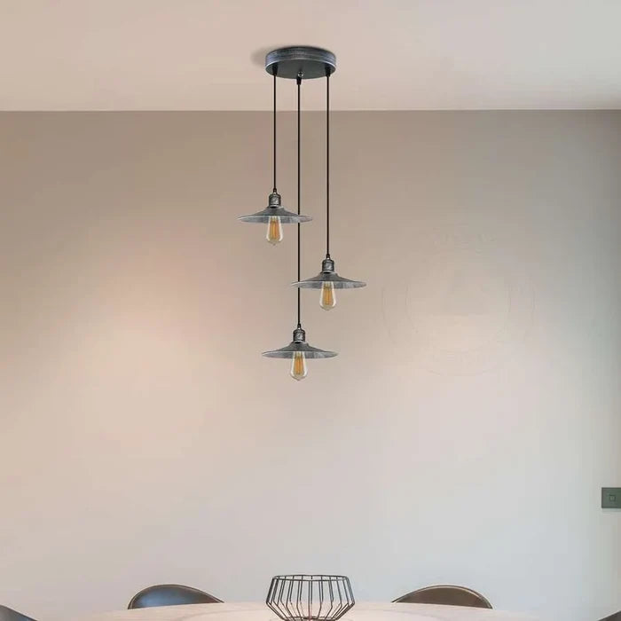 metal cone shade ceiling pendant light  over dining table