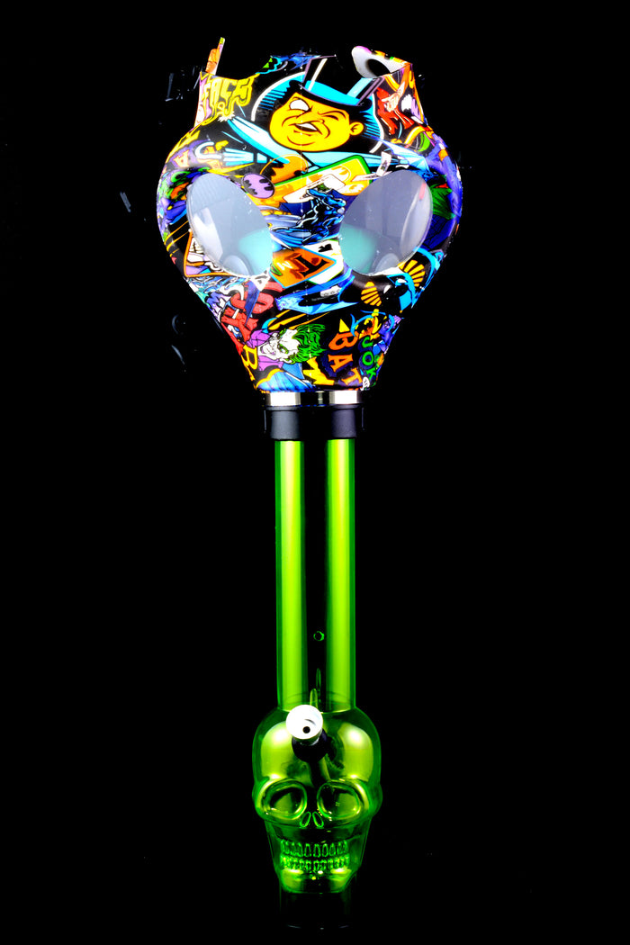 Green skull-base acrylic bong with comic-villain decal gas mask in bold multicolor print.