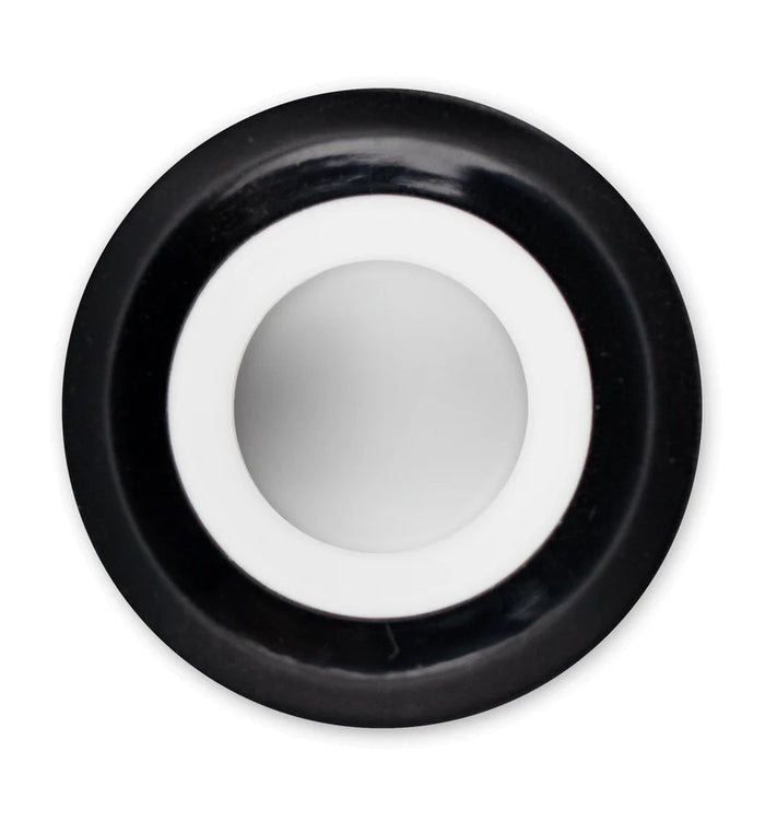 Overhead view of the Proxy 3D Chamber’s white ceramic bowl surface centered inside the round opening.