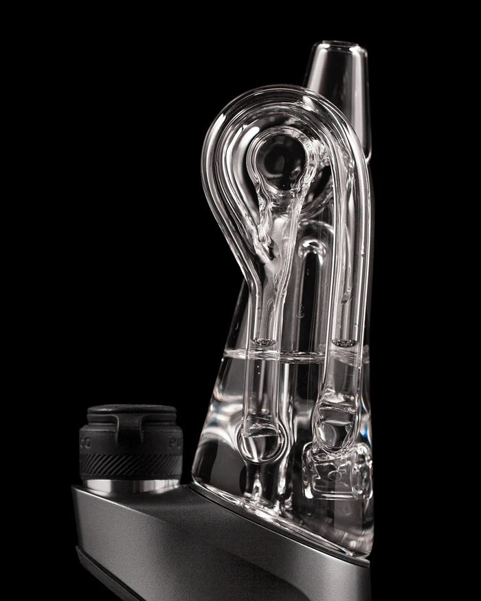 Detail view of looped recycler pathway and return drain on the Ryan Fitt 2.0 glass attachment with visible waterline.