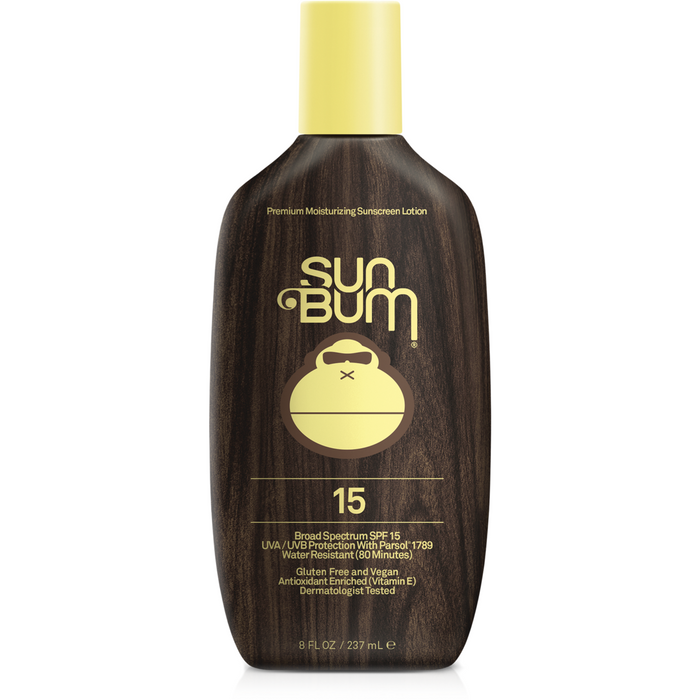 Sun Bum Original SPF 15 Sunscreen Lotion bottle with wood grain texture and gold logo