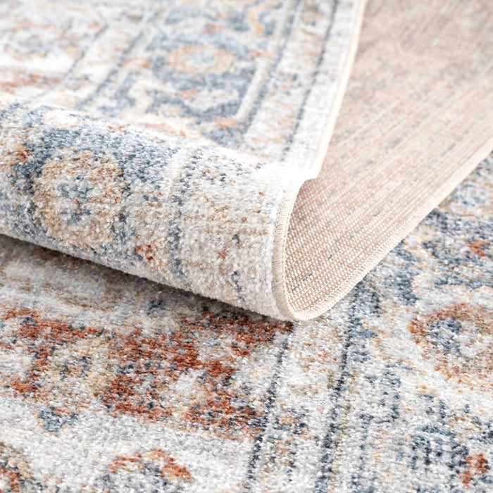 Traditional Heriz Ivory, Rust and Blue Medallion Design Low Pile Washable Area Rug - The Rug Decor